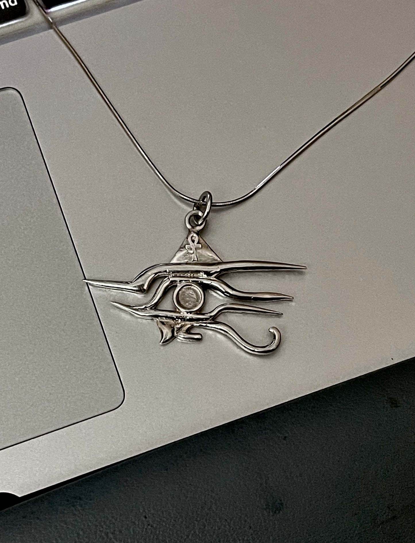 New era Horus eyes necklace.